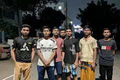 Bangladeshi workers from Process Maintenance Solutions and Jurong Technical & Construction outside their dormitories in Tuas on Oct 24.