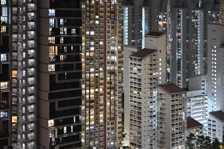 Dawson HDB estate with its lights on at night in April 2026.