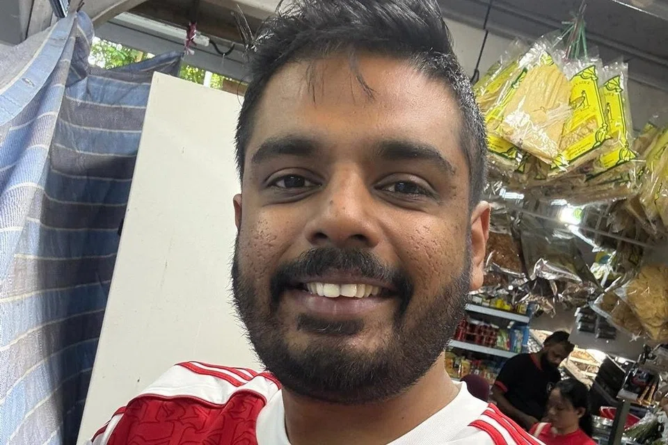 J Jeyaseelan in an Arsenal jersey