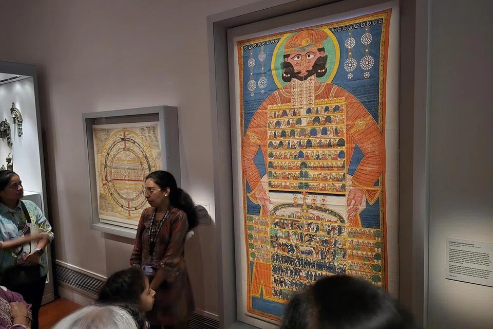 The painting of the Lokapurusha or the Cosmic Man, the visual representation of the Jain spiritual universe of heaven, hell and the living world.