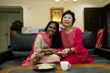 Mdm Vijayalakshmi Raja and Mdm Jessie Heah sharing a close bond.
