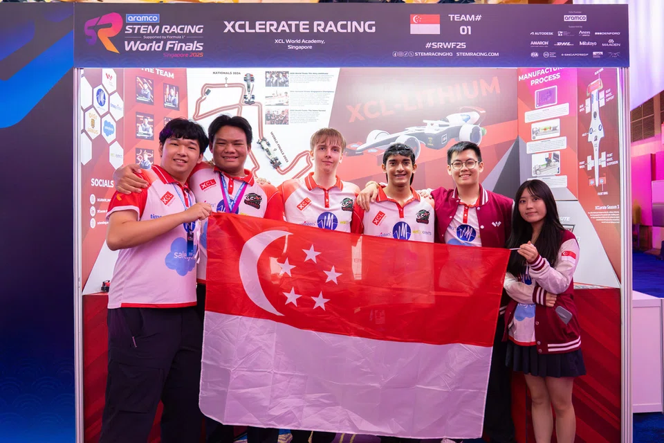 Glen Coutinho and his team, XCLerate Racing, at the STEM Racing World Finals at Resort World Sentosa in Singapore.