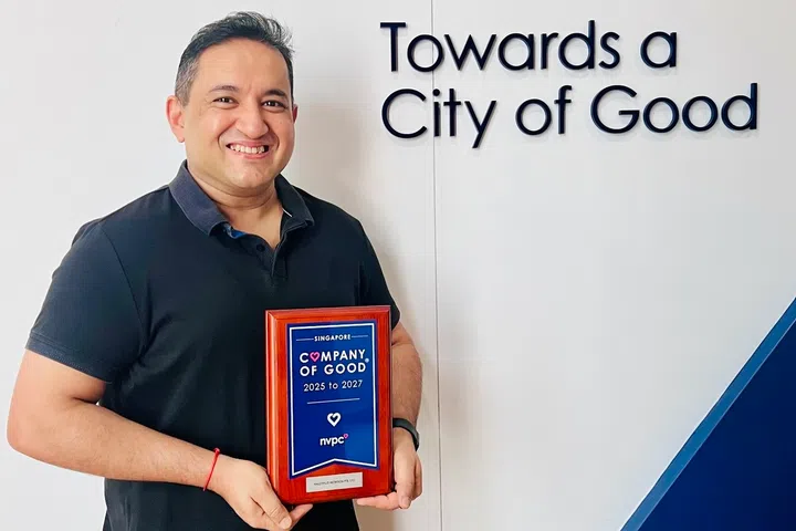 Mr Push Sharma with the NVPC Singapore Company of Good award for 2025-2027.