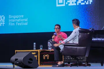 Aamir Khan (in pink kurta) speaking at SGIFF’s In Conversation With series panel discussion with moderator Rishi Budhrani on Oct 22.
