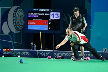 Para-lawn bowler Mawjit Singh rolling a bowl during the 2026 Commonwealth Games in Glasgow, Scotland.