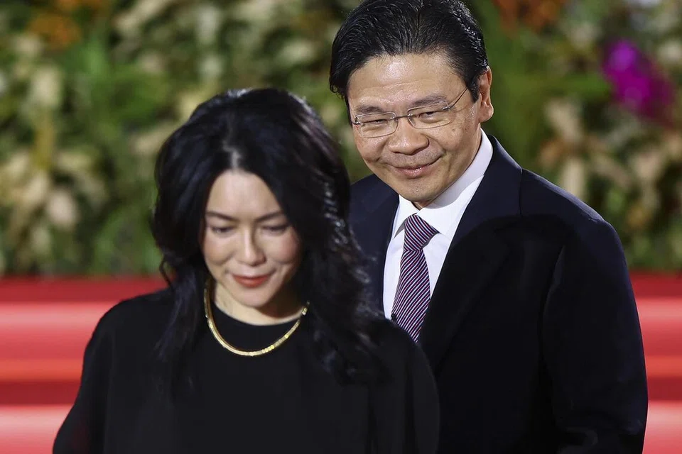 PM Wong with his wife Loo Tze Lui at the Istana.