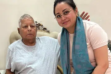 Mrs Rohini Acharya with father and Rashtriya Janata Dal supremo Lalu Prasad Yadav. 
