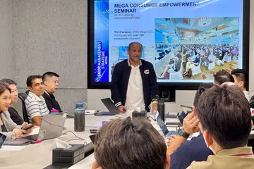 Mr Ismail Gafoor at a PropNex management meeting