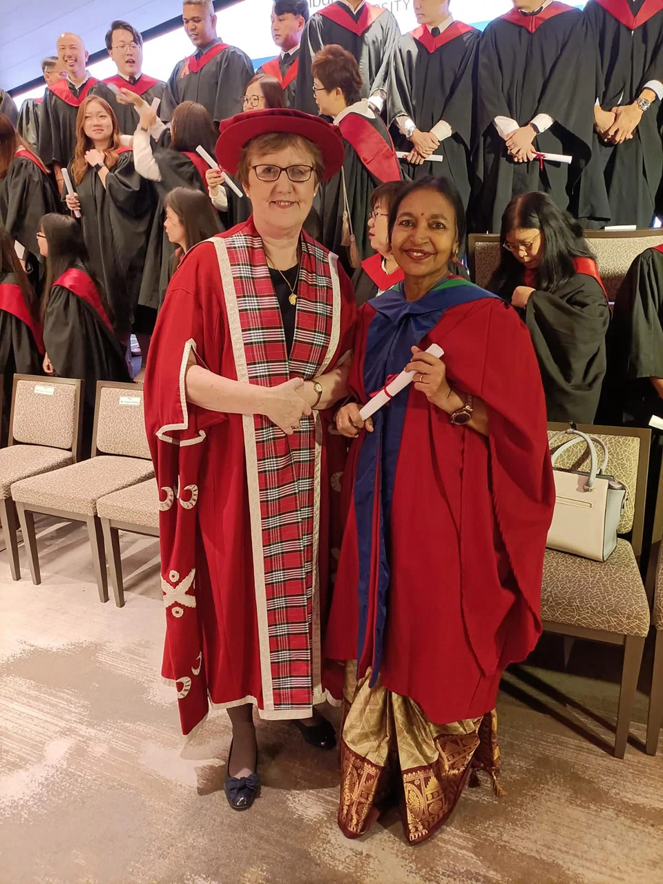 Dr Prema with the vice-chancellor of Edinburg Napier University.