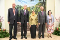 PM Lee Hsien Loong with Madam Halimah Yacob at the farewell reception on Sept 13.