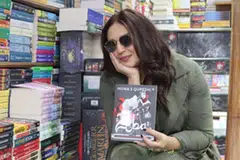 Actress Huma Qureshi signs copies of her first novel Zeba: An Accidental Superhero at a popular bookstore in New Delhi.