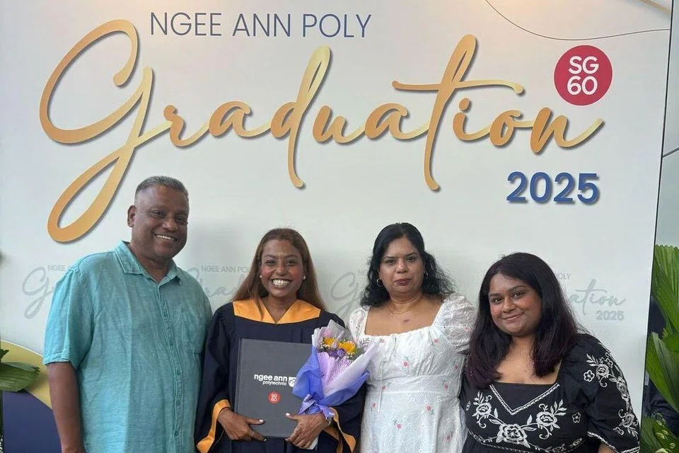 Sister Grace Krishnan (in white) and her family at her daughter Harini Murugan’s graduation ceremony at Ngee Ann Polytechnic.