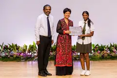 Minister in the Prime Minister’s Office Indranee Rajah (centre) presented a Special Achievement Award to Changkat Changi Secondary School student Priska Roshini Richard Ravi, who created an AI-powered tutoring app. SINDA Chief Executive Officer Anbarasu Rajendran was also present.