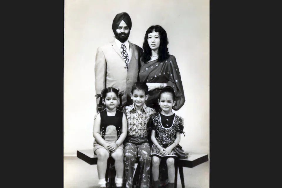 Gurmit with his parents and sisters.