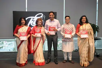 Guest of Honour, Minister of State for Culture, Community and Youth, and Manpower Dinesh Vasu Dash (centre), launching the book “Echoes of Bengal in the Lion City – Glimpses of the Bengali Diaspora in Singapore”.