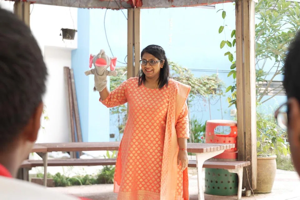 Madam Jayasutha Vijaya Kumaran of Seng Kang Primary school, uses puppetry to act out stories in class. 