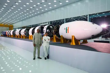 Mr Naga Bharath Daka and Mr Pawan Kumar Chandana (right), founders of Skyroot Aerospace, pose in front of Vikram-I, India's first private commercial rocket.