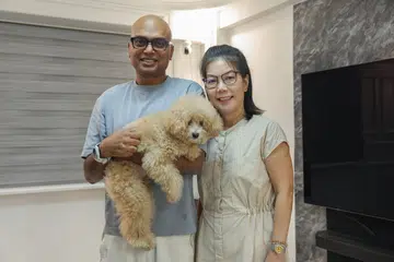 Once a youth-at-risk, the now 47-year-old Shanker Manokaran finds strength and balance in the support of his wife, Madam Christine Wong, and their pet dog, Hazel, his constant companions through life’s ups and downs.