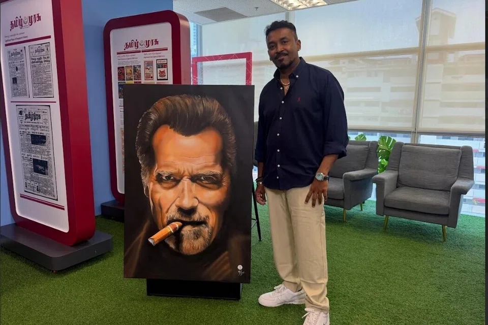 Mr Saravanan with his 3D pop art portrait of Hollywood actor Arnold Schwarzenegger at the Tamil Murasu office.