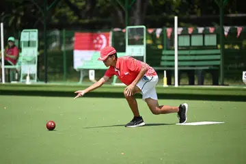 Singapore’s Isaac Yu on his way to winning the Under-25 men’s sets title with teammate Harriman Yuen at the Lion City Cup on July 27. 