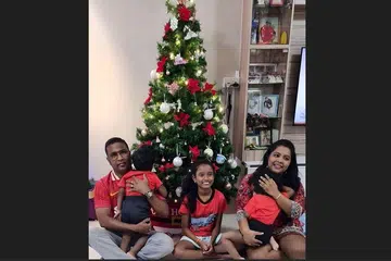 Mr David Noel Ariokiasamy and his wife Anjelan Paul Anthony with their biological daughter and foster children.