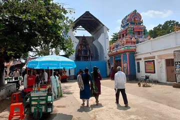 Visitors outside the Balaji Temple in Chilkur, near Hyderabad in Telangana. The temple is popularly known as a "visa temple", drawing Indians who pray there for better chances of migrating abroad.