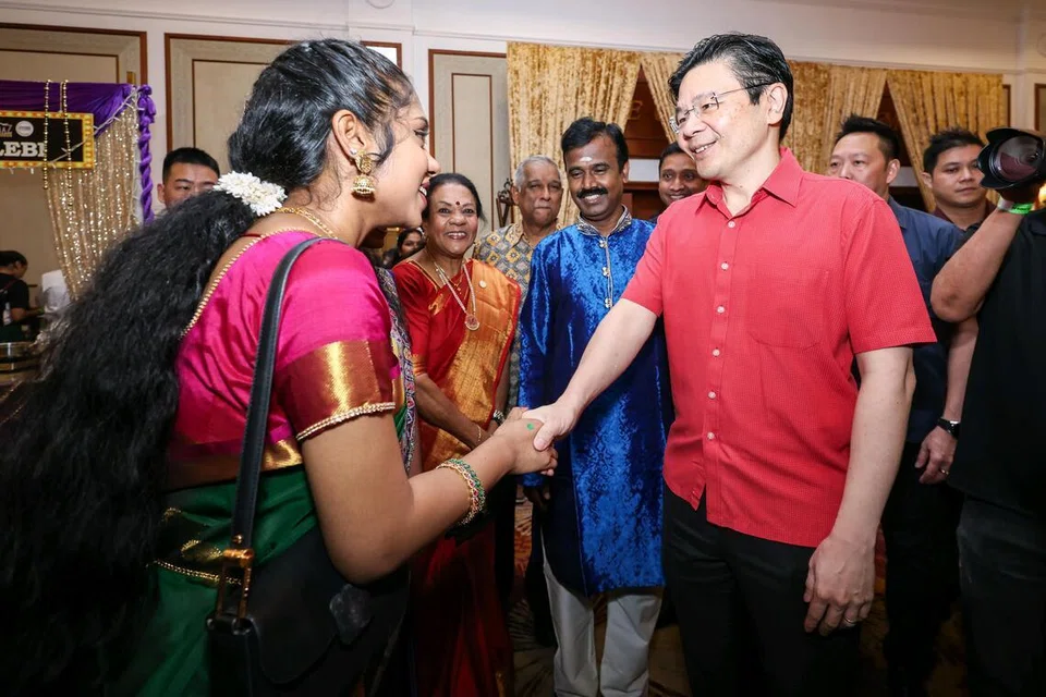 Shruthika Kumar (left), 22, greeting Prime Minister Lawrence Wong during the Singapore Tamil Teachers’ Union’s 75th anniversary dinner at Orchid Country Club on July 17, 2026.