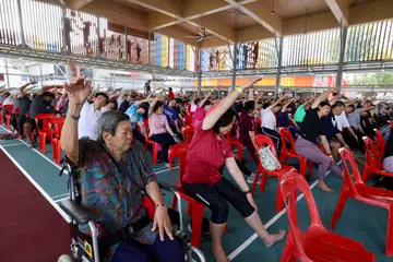 370 residents participated in Singapore’s Largest Mass Chair Yoga session at Toa Payoh on June 22.