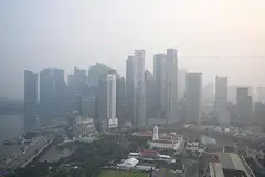 Haze shrouding the Singapore skyline taken from Swissotel The Stamford at about 6pm on Oct 7, 2026.