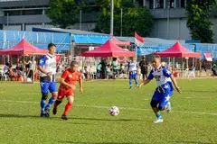 Minister for Law Edwin Tong (centre) playing as part of the Parliament team against Singapore’s legendary 1993 ‘Dream Team’ at Singapore Indian Association’s  fifth annual National Day Sports Fiesta.