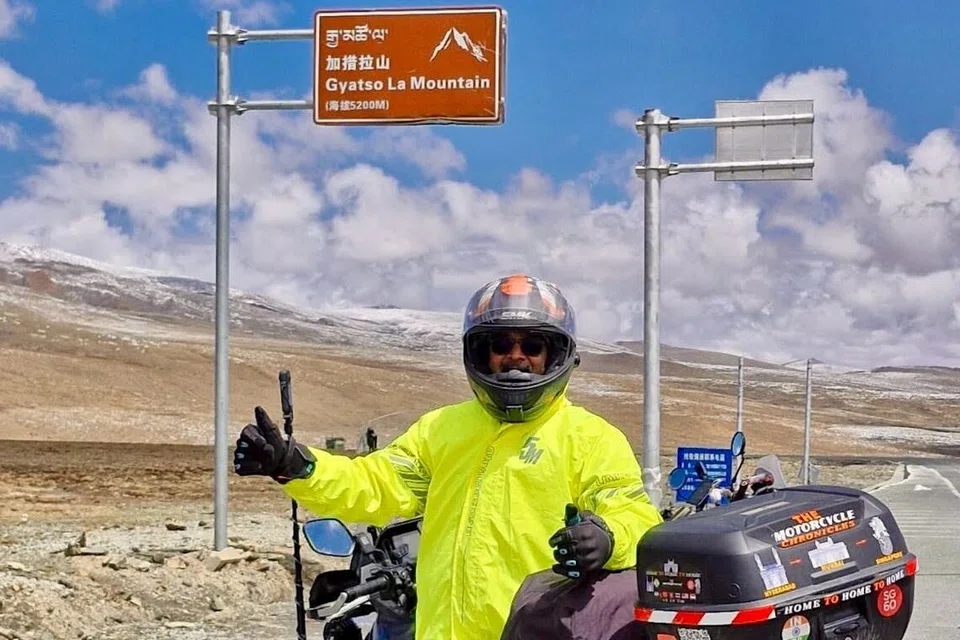 Mr Narayanachar at the Gyatso La Mountain landmark which has an altitude of 5,200m above sea level.