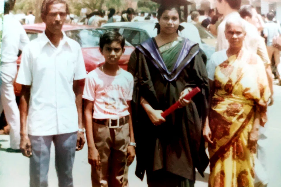 Jensrani with her parents and brother at her graduation ceremony at Nanyang University.
