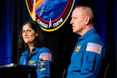 (L-R) Astronauts Sunita "Suni" Williams, and Barry "Butch" Wilmore speak during a news conference at the NASA Johnson Space Center on March 31, 2025 in Houston, Texas. 