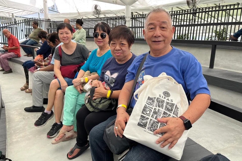 Mr Ng Seng Lye (far right) and his fellow Queenstown residents at the SIFAS Middle Road campus.