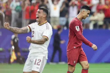 Cristiano Ronaldo (right) reacts after Portugal lost their round of 16 match to Spain at the Dallas Stadium on July 6.