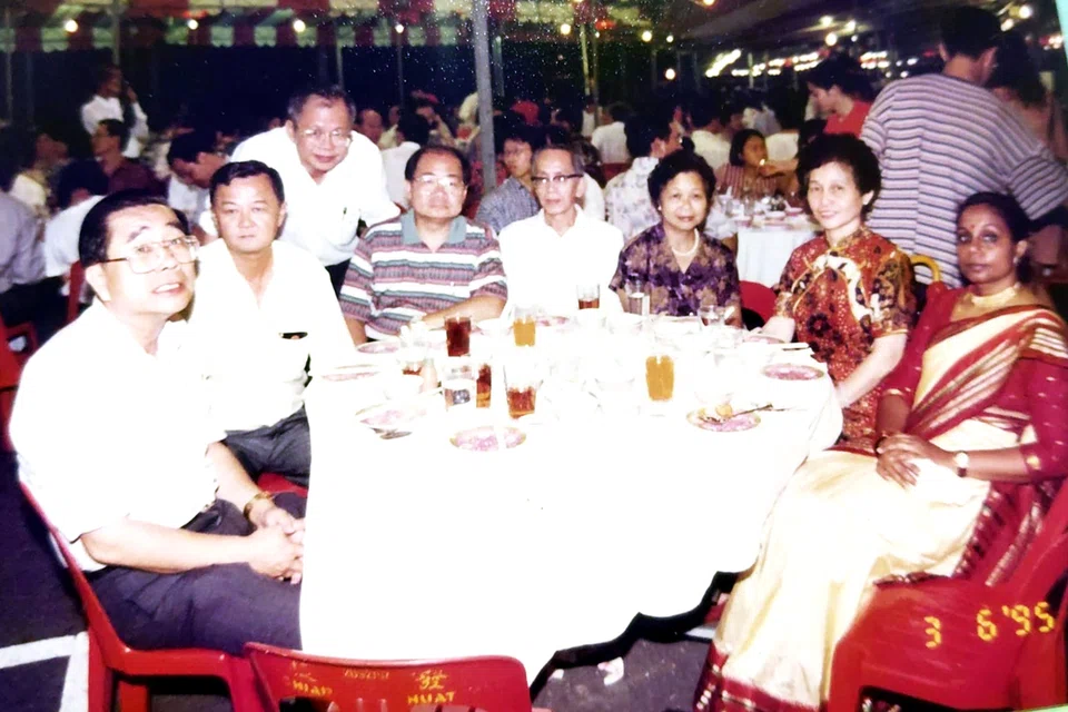 Jensrani with her family at her graduation ceremony at Nanyang University.