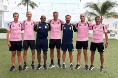 Ganesan Maniam (third from left) with trainers and referees, including Slovenian Slavko Vincic (centre) who officiated the 2026 FIFA World Cup final between Spain and Argentina.