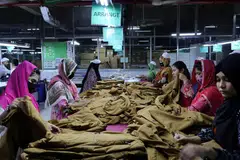 Employees work at the 4A Yarn Dyeing Limited factory, amid the energy crisis, in Savar, on the outskirts of Dhaka, Bangladesh