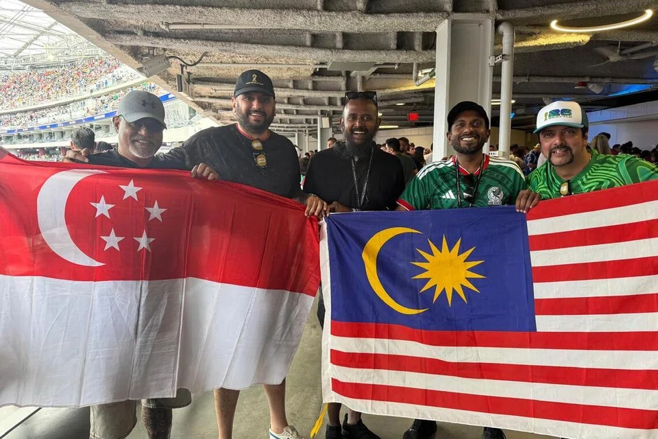Singapore and Malaysia football fans at the FIFA World Cup.