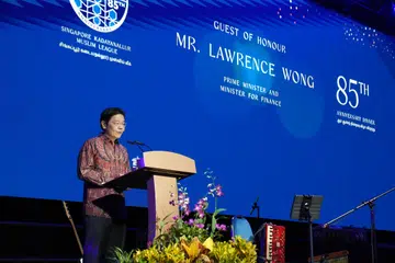 Prime Minister Lawrence Wong speaking at the 85th anniversary celebration of the Singapore Kadayanallur Muslim League on Sept 12.