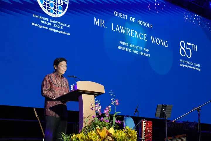 Prime Minister Lawrence Wong speaking at the 85th anniversary celebration of the Singapore Kadayanallur Muslim League on Sept 12.