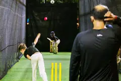 (Left) Players at the Singapore Cricket Club Academy using the Level Up cameras-aided app to improve their game; (above) Sitanshu Dash.