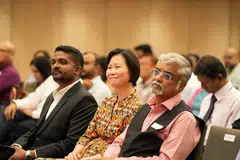 MOS Gan seated with tabla! Editor Venga Subramaniam (left) and SICCI CEO Predeep Menon (right)