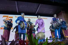 Prime Minister Lawrence Wong took to the stage with Senior Minister of State for Transport and Law Murali Pillai and Minister of State for Culture, Community, Youth and Manpower Dinesh Vasu Dash, to play traditional Indian drums.