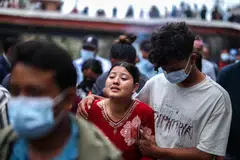 Relatives of Sabin Timalsina, 21, mourn during his cremation rituals using an effigy as his body remained missing following the deadly flash floods and mudslide, on the premises of Pashupatinath Temple in Kathmandu, Nepal, September 2, 2026.