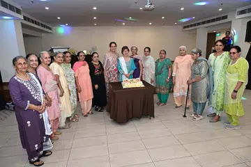 Istri Sat Sang Singapore’s 2025-2027 executive committee with the Mayor of Central Singapore District Denise Phua at the society’s 80th anniversary celebration event.