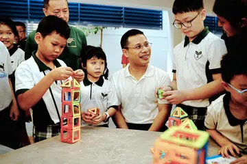 Minister for Education, Mr Desmond Lee during a regular school visit to Teck Ghee Primary School.