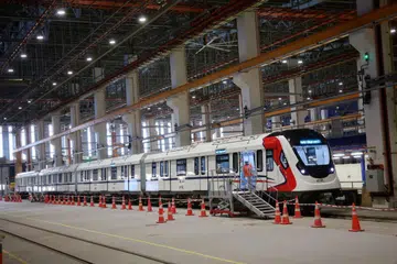 The 76.5m-long train of four cars, each with three doors on either side.