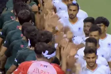 Paksitan (in green) and Inda players exchanging handshakes and high-fives  during their match at the Sultan of Johor Cup in Malaysia on Oct 14.