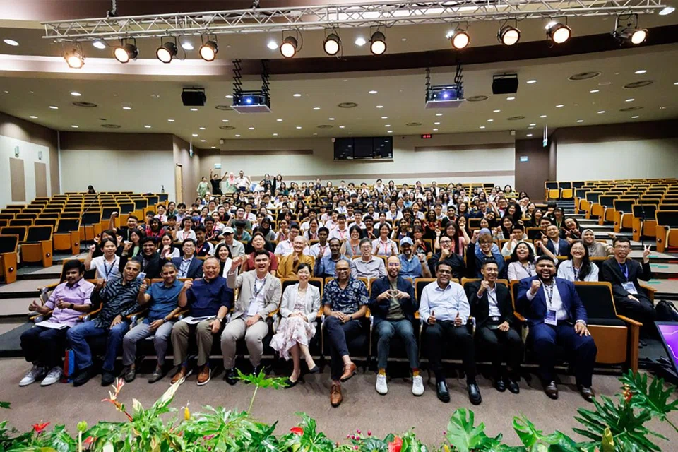 Over 200 youth participants, advocates, and community leaders gather for a group photo at the conclusion of the HarmonyWorks! Conference 2026 at the National University of Singapore.
